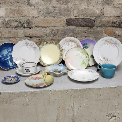 Sale Photo Thumbnail #250: Misc porcelain and stoneware clean up lot. The small plate is metal. Gorgeous hand painted pieces and an odd Fiesta harlequin cup.