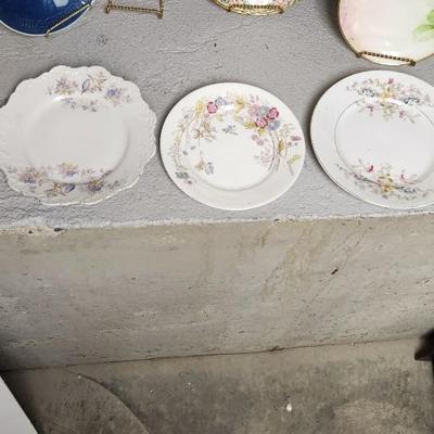 Sale Photo Thumbnail #258: Misc porcelain and stoneware clean up lot. The small plate is metal. Gorgeous hand painted pieces and an odd Fiesta harlequin cup.