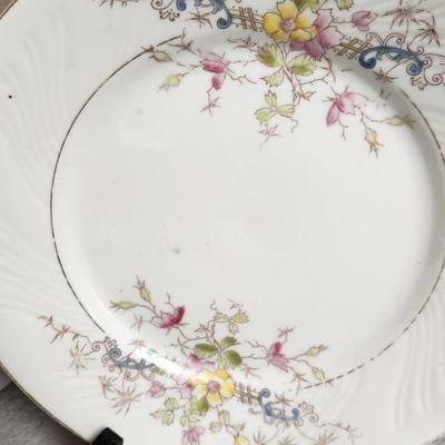 Sale Photo Thumbnail #252: Misc porcelain and stoneware clean up lot. The small plate is metal. Gorgeous hand painted pieces and an odd Fiesta harlequin cup.