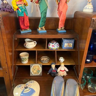 Sale Photo Thumbnail #20: Antique Cabinet/Desk
Asian Dolls, Blue Glass and more.
