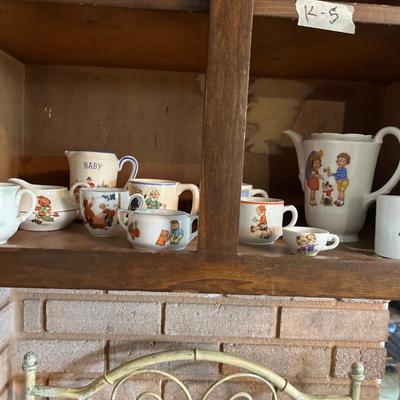 Sale Photo Thumbnail #64: Children’s Dishes Cups, plates, Silverware

Bakers rack not included