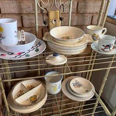 Sale Photo Thumbnail #67: Children’s Dishes Cups, plates, Silverware

Bakers rack not included