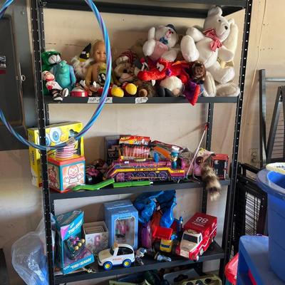 Sale Photo Thumbnail #197: Toys, Stuffed animals, cars, plastic table and storage.