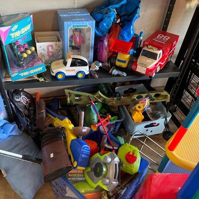 Sale Photo Thumbnail #198: Toys, Stuffed animals, cars, plastic table and storage.