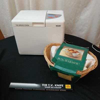 The Bread Oven by Welbilt with bread warming basket, and a brand new bread knife