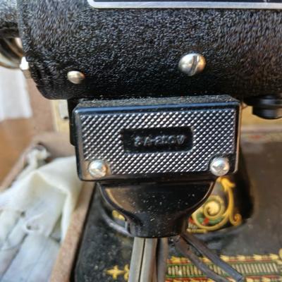Early 19th century Singer Sewing machine with case and a folding sewing table