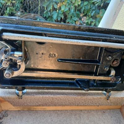 Early 19th century Singer Sewing machine with case and a folding sewing table