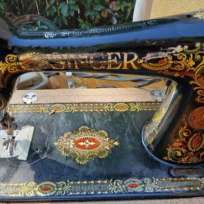 Early 19th century Singer Sewing machine with case and a folding sewing table