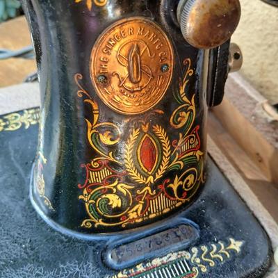 Early 19th century Singer Sewing machine with case and a folding sewing table
