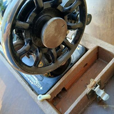Early 19th century Singer Sewing machine with case and a folding sewing table