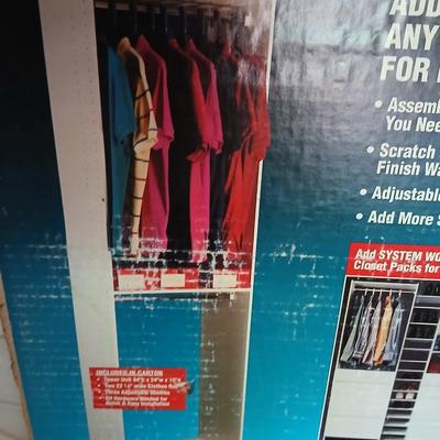 Starter pack closet organizer - appears complete with hardware - still needs assembly
