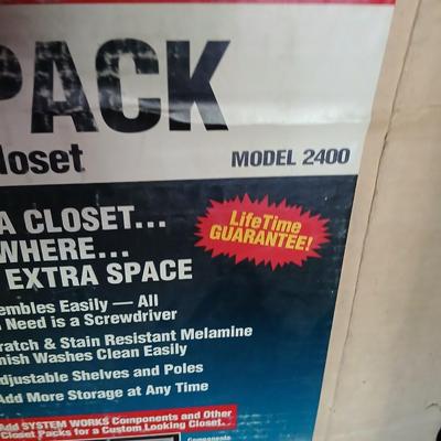 Starter pack closet organizer - appears complete with hardware - still needs assembly