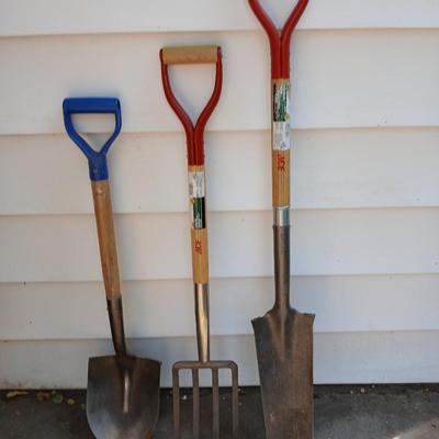 Three short, handled hand tools - Shovel - Digging fork - and a Drain Spade