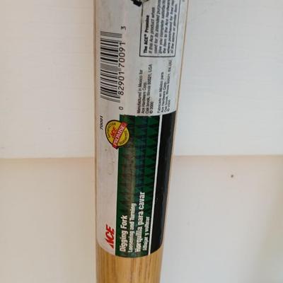 Three short, handled hand tools - Shovel - Digging fork - and a Drain Spade