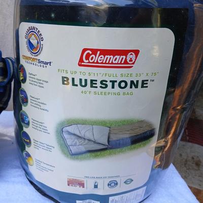 Coleman Bluestone sleeping bag with small Igloo cooler