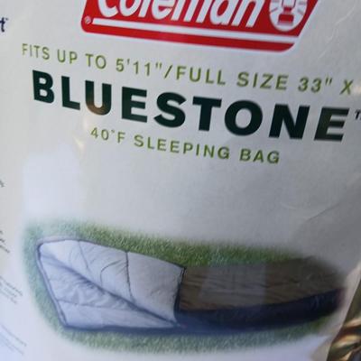 Coleman Bluestone sleeping bag with small Igloo cooler