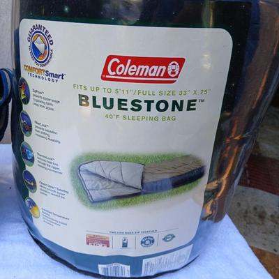 Coleman Bluestone sleeping bag with small Igloo cooler