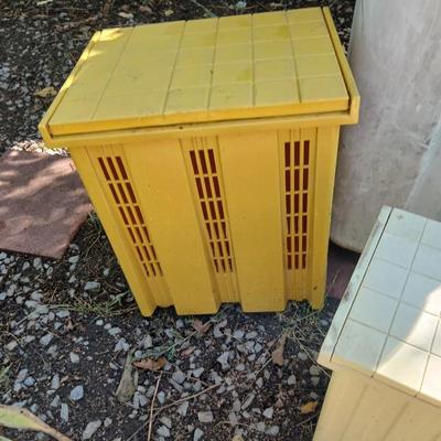 Large sized rolling garbage bin with several smaller plastic trash cans / containers