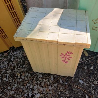 Large sized rolling garbage bin with several smaller plastic trash cans / containers