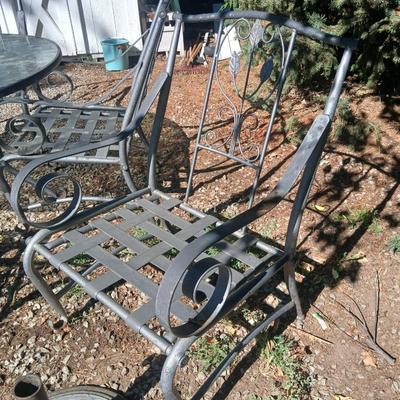 Martha Stewart patio table with etched glass and lazy susan comes with 5 metal chairs and weighted umbrella stand