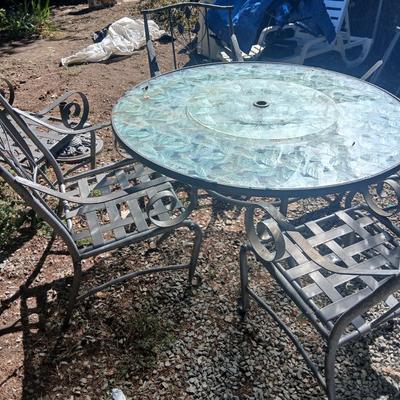 Martha Stewart patio table with etched glass and lazy susan comes with 5 metal chairs and weighted umbrella stand