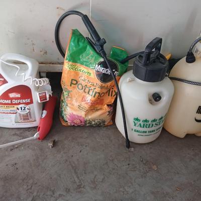 Ortho Home defense insect killer with two-yard weed sprayers and a partial bag of potting soil
