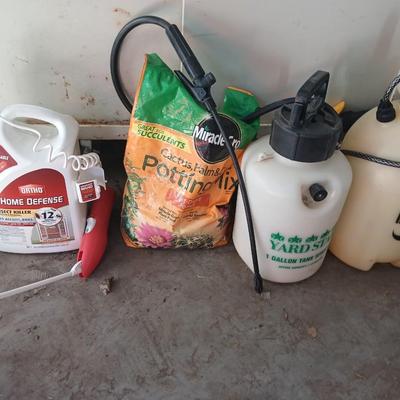 Ortho Home defense insect killer with two-yard weed sprayers and a partial bag of potting soil