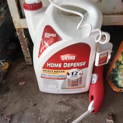 Ortho Home defense insect killer with two-yard weed sprayers and a partial bag of potting soil