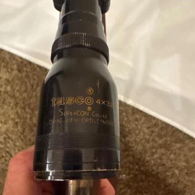 Sale Photo Thumbnail #31: Remington Model 700. 243 WIN with a 21 inch barrel and a Tasco 4x32 scope. This one will need a good cleaning as it is dusty.