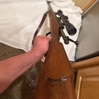 Sale Photo Thumbnail #30: Remington Model 700. 243 WIN with a 21 inch barrel and a Tasco 4x32 scope. This one will need a good cleaning as it is dusty.