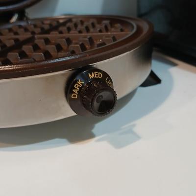 TOaster and a waffle maker griddle