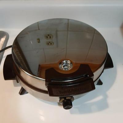 TOaster and a waffle maker griddle