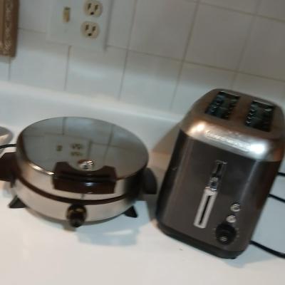 TOaster and a waffle maker griddle