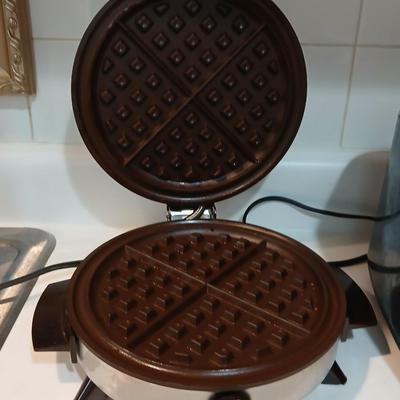 TOaster and a waffle maker griddle