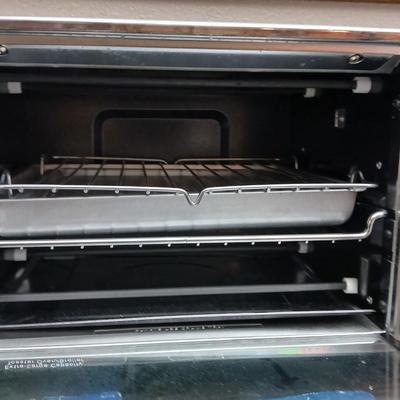Toaster oven Model A3430CJ with an assortment of thermometers