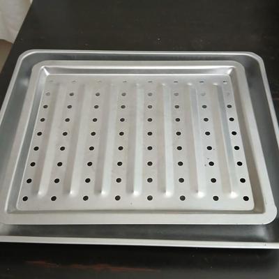 Toaster oven Model A3430CJ with an assortment of thermometers