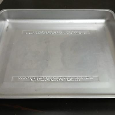 Toaster oven Model A3430CJ with an assortment of thermometers