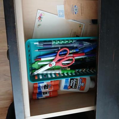 Small black student desk with keyboard tray and three drawers - full of office supplies!!