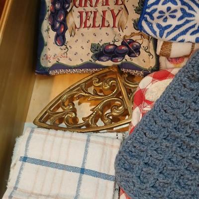 Kitchen towels - hot pads - coasters - and refrigerator magnets