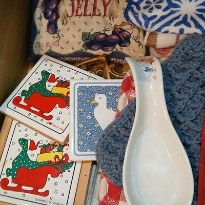 Kitchen towels - hot pads - coasters - and refrigerator magnets