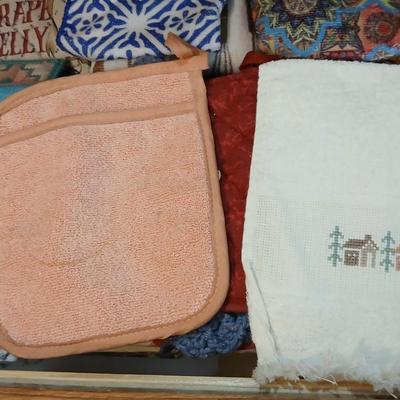 Kitchen towels - hot pads - coasters - and refrigerator magnets