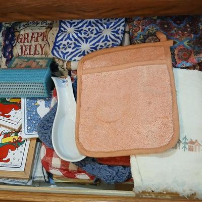 Kitchen towels - hot pads - coasters - and refrigerator magnets