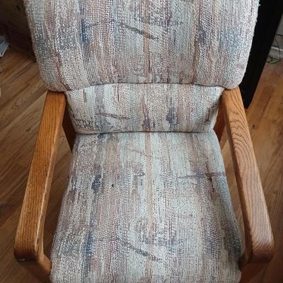 Oak diningroom table with claw foot base - 4 fabric covered chairs and two table leafs.