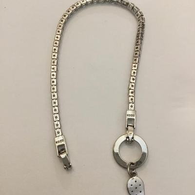Beautiful vintage watch over me tennis bracelet. Crystal rhinestone angel wing charm very nice very beautiful.