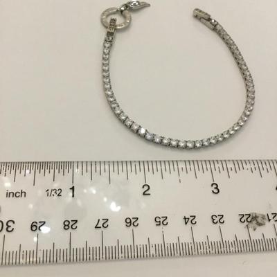 Beautiful vintage watch over me tennis bracelet. Crystal rhinestone angel wing charm very nice very beautiful.