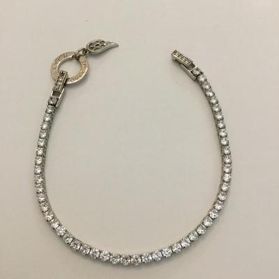 Beautiful vintage watch over me tennis bracelet. Crystal rhinestone angel wing charm very nice very beautiful.