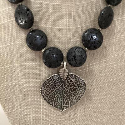 Black stone necklace with large leaf pendant