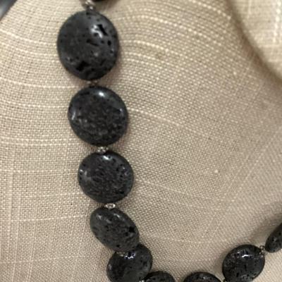 Black stone necklace with large leaf pendant