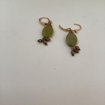 Warm toned necklace and earring set. Green stone