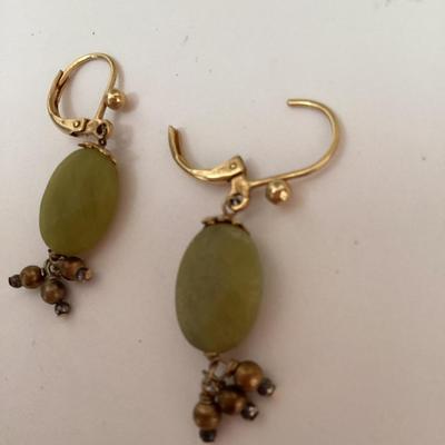 Warm toned necklace and earring set. Green stone